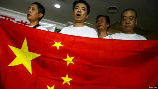 मलेशियाई विमान में सवार चीनी यात्रियों के रिश्तेदार