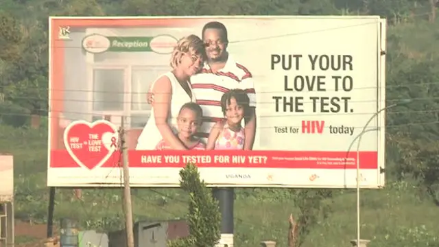 Pancarta en Uganda urgiendo a la gente a hacerse el test del sida