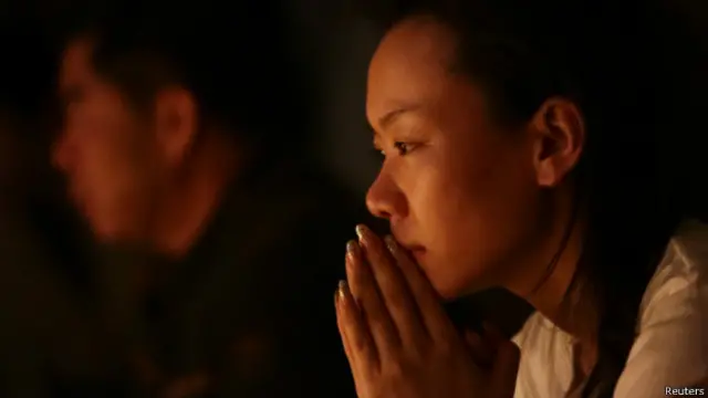 馬航失聯乘客家屬在北京麗都飯店舉行燭光祈福活動（07/04/2014）