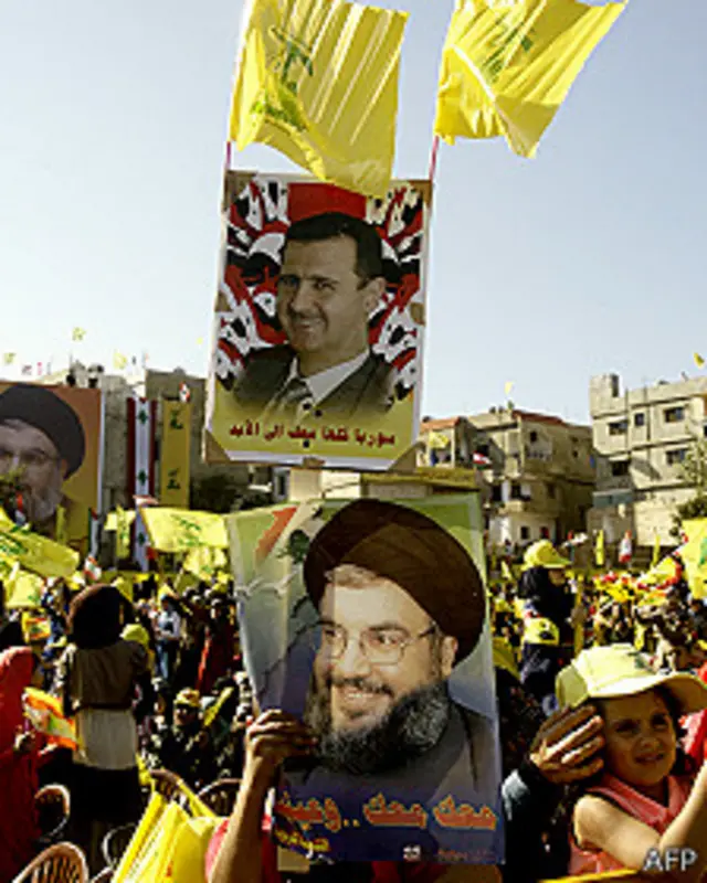 Partidarios de Asad y Nasrallah en Damasco