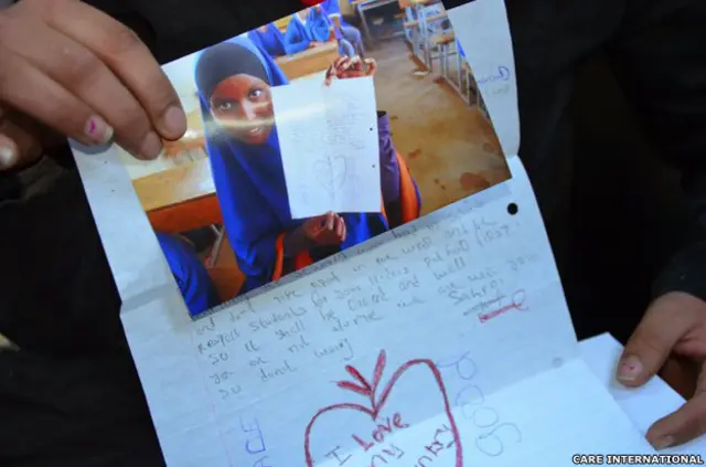 Sobre con carta y foto 