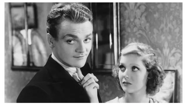 لورتا یانگ و جیمز کاگنی در فیلم تاکسی