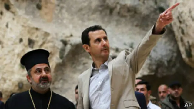 Башар Асад (справа)