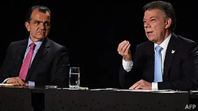 Óscar Iván Zuluaga y Juan Manuel Santos