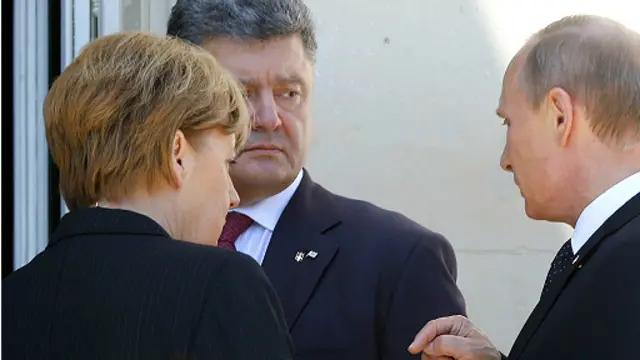 俄国总统普京和乌克兰候任总统波罗申科在诺曼底登陆纪念活动见面。