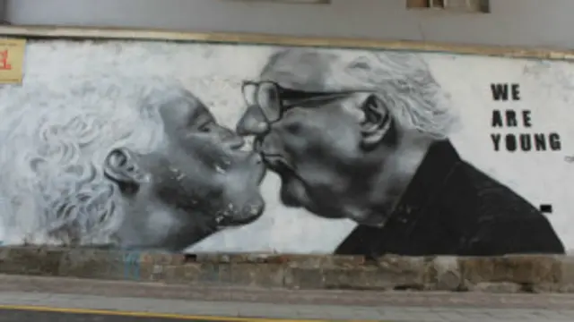 සෝල් නුවර වීදියක ඇඳි කාටූන් චිත්‍රයක් 