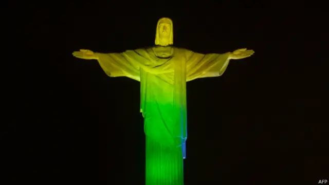 Cristo Redentor com cores do Brasil. Foto: AFP