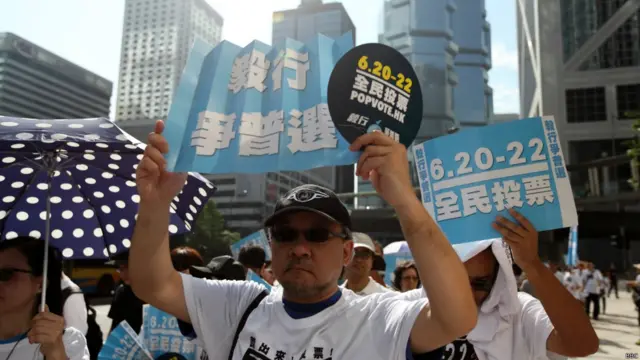 一连七天的“毅行争普选”活动在香港中环遮打花园起步（BBC中文网照片，14/06/2014）