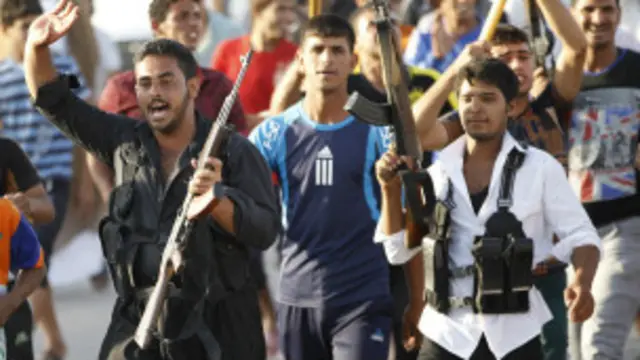 د نوري المالکي په غوښتنه عراقي شیعه ګانو د داعش پرضد وسلې راخیستې دي.