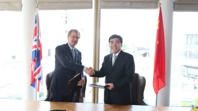 伦敦证券交易所董事长高博深与中国银行董事长田国立