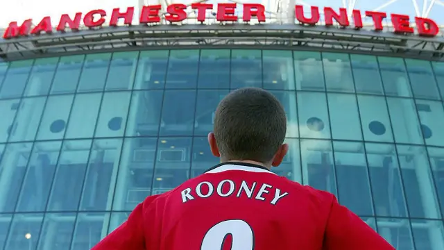 Мальчик в футболке Руни