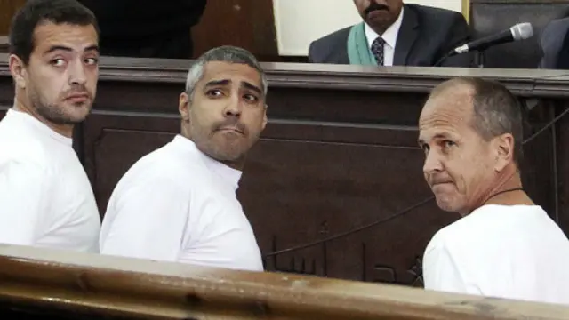 الصحفيون الثلاثة، بيتر غريسته، ومحمد فهمي، وباهر محمد نفوا التهم جميعا.