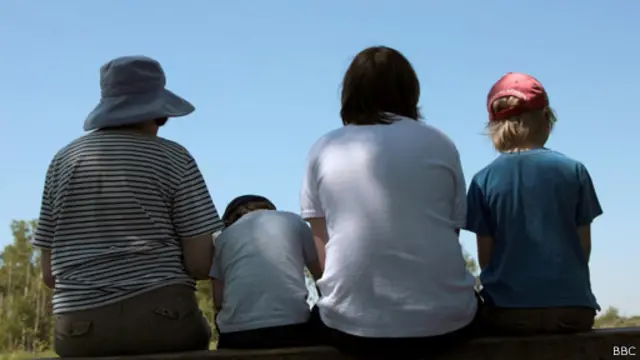 Бабушка с тремя внуками