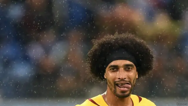 Pemain Kamerun, Benoit Assou Ekotto, adalah salah satu yang setia dengan gaya rambut kribo.