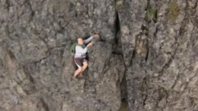 montanhista em apuros