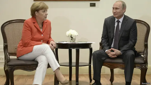 Vladimir Putin y Angela Merkel en Río de Janeiro