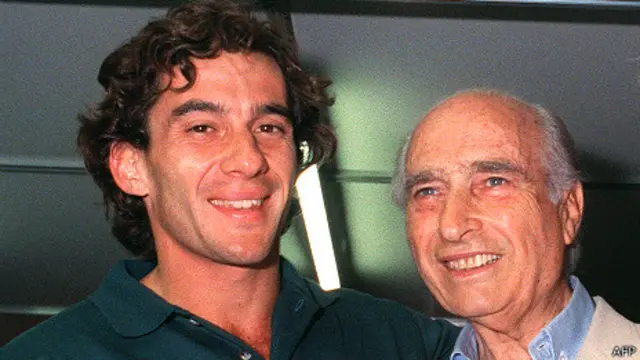Juan Manuel Fangio junto a Ayrton Senna