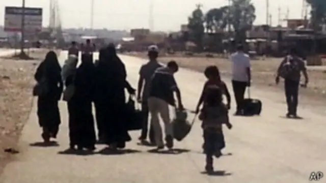 Cristianos abandonando Mosul