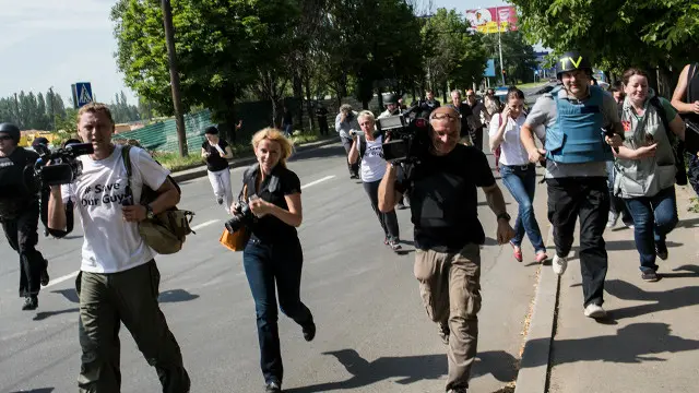 Журналісти