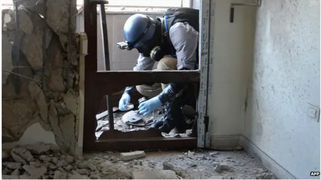 सीरिया की राजधानी दमिश्क के घाउटा में संयुक्त राष्ट्र इंस्पेक्टर, 2013