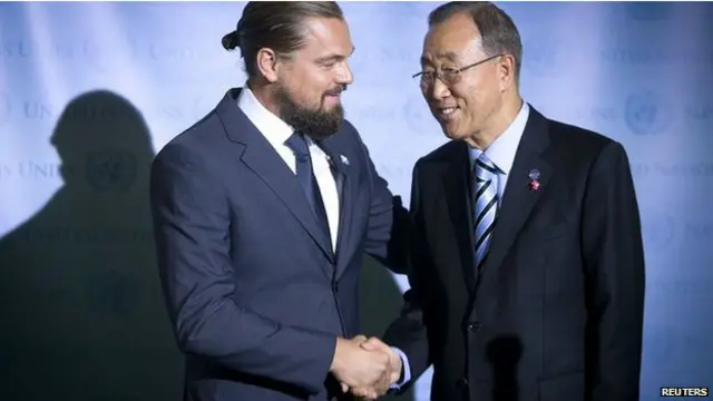 遊行人群中包括聯合國秘書長潘基文(右)和好萊塢明星迪卡普裏奧。