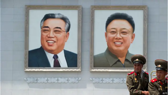 Портретв Ким Ир Сена и Ким Чен Ира