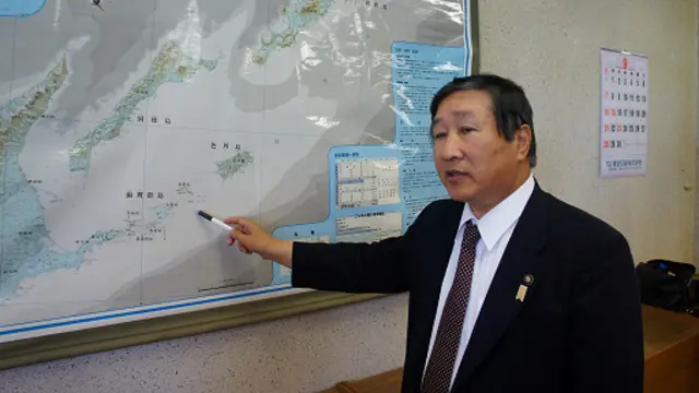 根室市长指着齿舞、色丹两岛说，这里的渔业权可扩大好多