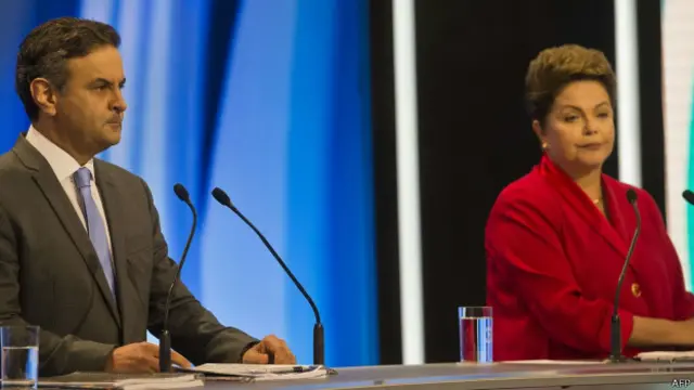 Dilma e Aécio no debate da Record / Crédito: AFP