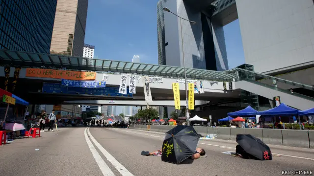 人民日报：香港“占中”是少数人在西方势力支持下的有预谋的行动