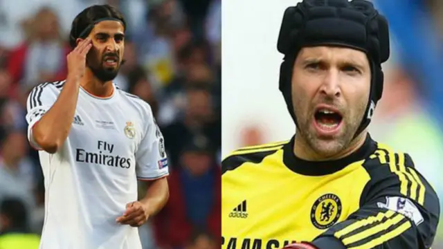 皇马中场赫迪拉(左)和切尔西门将切赫