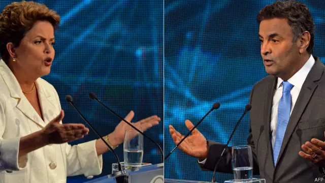Dilma Rousseff y Aécio Neves en su debate en la red Bandeirantes