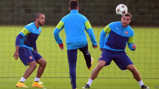 Theo Walcott, Alexis Sanchez dan Lukas Podolski mengincar tiga angka di Anderlecht.