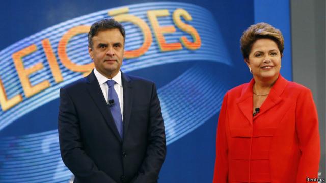 Candidatos presidenciales brasileños Aécio Neves y Dilma Rousseff durante su último debate.