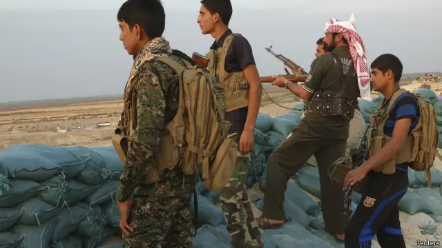 ساهم مقاتلون من ابناء العشائر السنية الى جانب القوات الحكومية في صد هجوم مسلحي التنظيم.