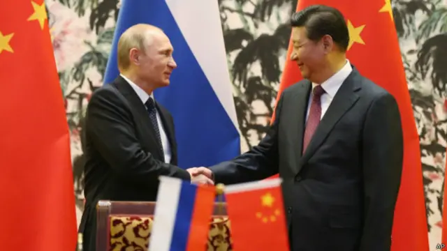 习近平会晤普京