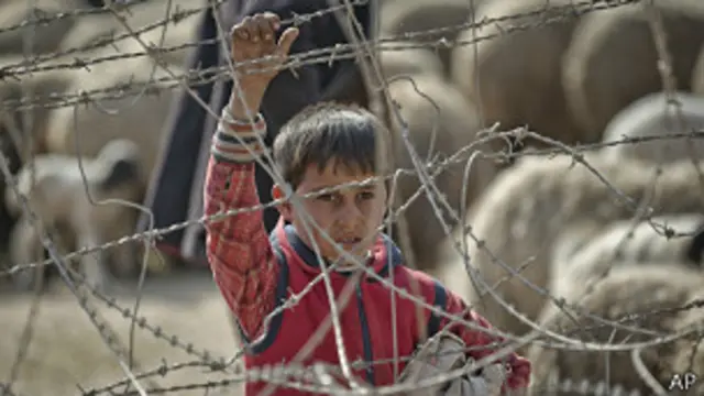 niño kurdo en siria