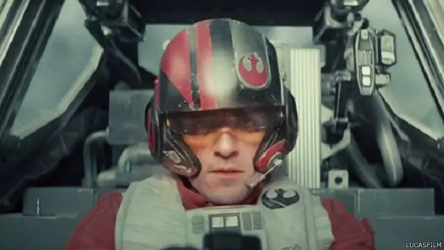 قائد طائرة، يعتقد المشاهدون بأنه الممثل أوسكار إيزاك، يقود مقاتلة "إكس-ونغ"