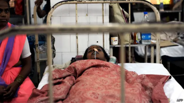 මැලේරියාව වැළඳුනු ඉන්දීය කාන්තාවක්   
