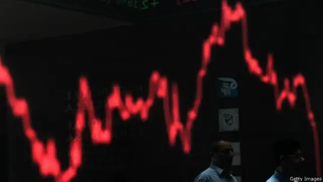 Экран фондовой биржи в Греции