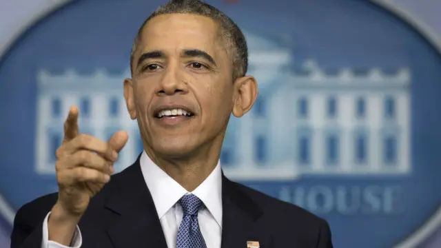 صدر اوباما اس سال کی آخری پریس بریفنگ میں بات کر رہے تھے