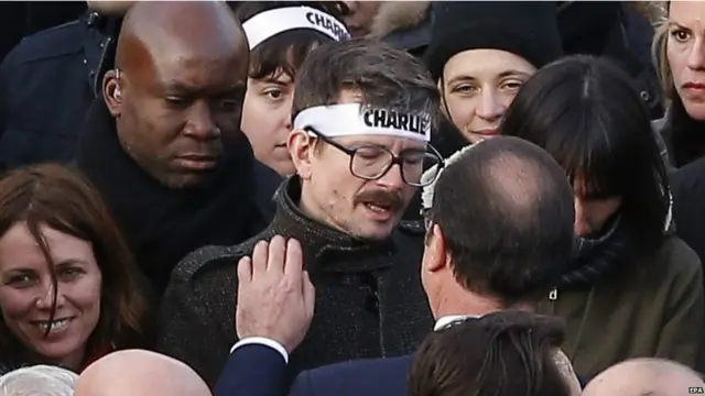 Cumhurbaşkanı Hollande, karikatürist Luz'u teselli etti.