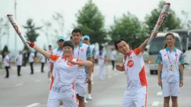 第12届全运会火炬传递(新华社图片)