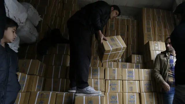 شام کے شہر حمہ میں خوارک تقسیم کیے جانے کا مرکز