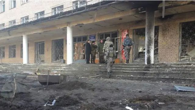 Обстрелянный дом