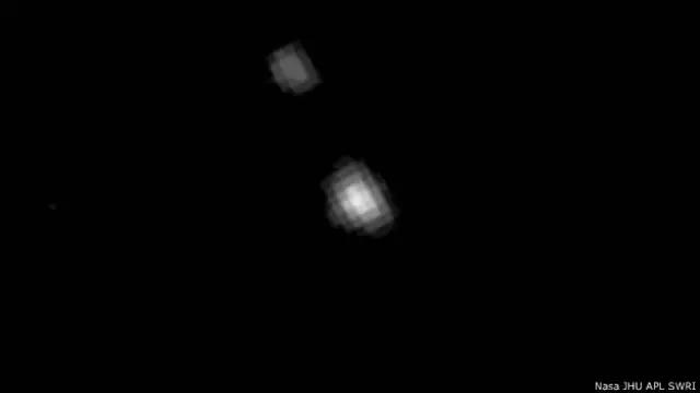 фото Плутона і Харона