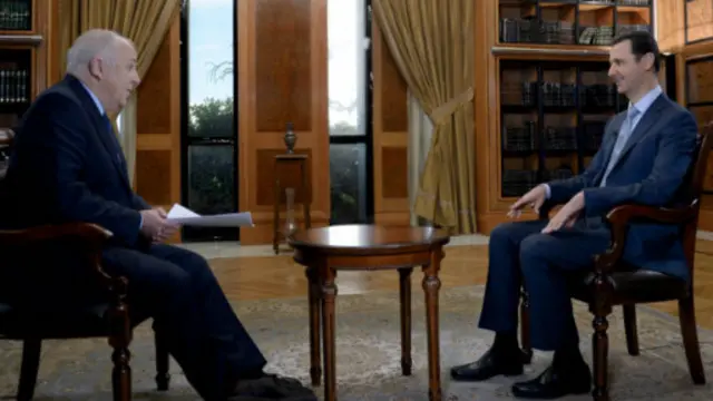 阿薩德(右)在大馬士革接受BBC中東事務編輯鮑恩專訪