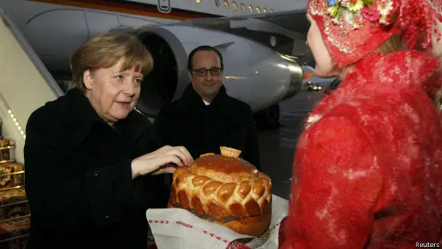 Першими до столиці Білорусі прилетіли пан Олланд і пані Меркель