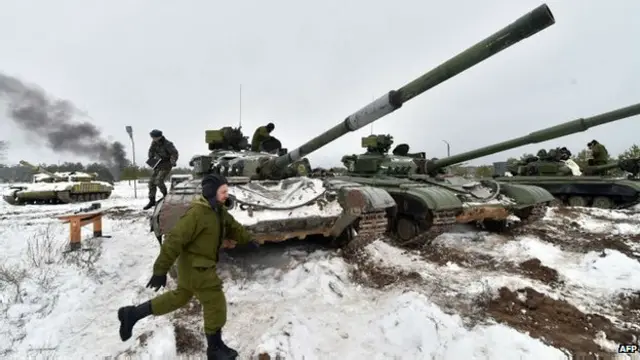 Pasukan Ukraina diperintahkan untuk menghentikan pertempuran setelah disepakati gencatan senjata dengan kelompok pemberontak pro-Rusia.