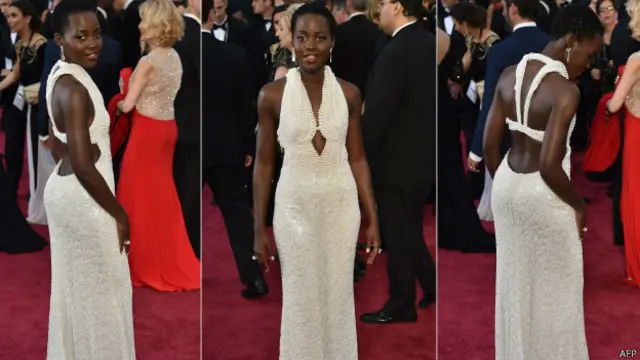 Gaun putih bertabur 6.000 mutiara putih asli 