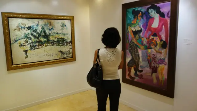 Andong Affandi dan Penjual Jambu Monyet karya Hendra Gunawan